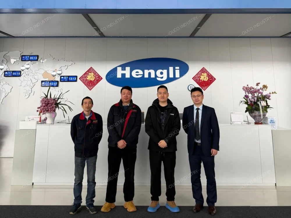 Group photo at the Hengli facility reception area