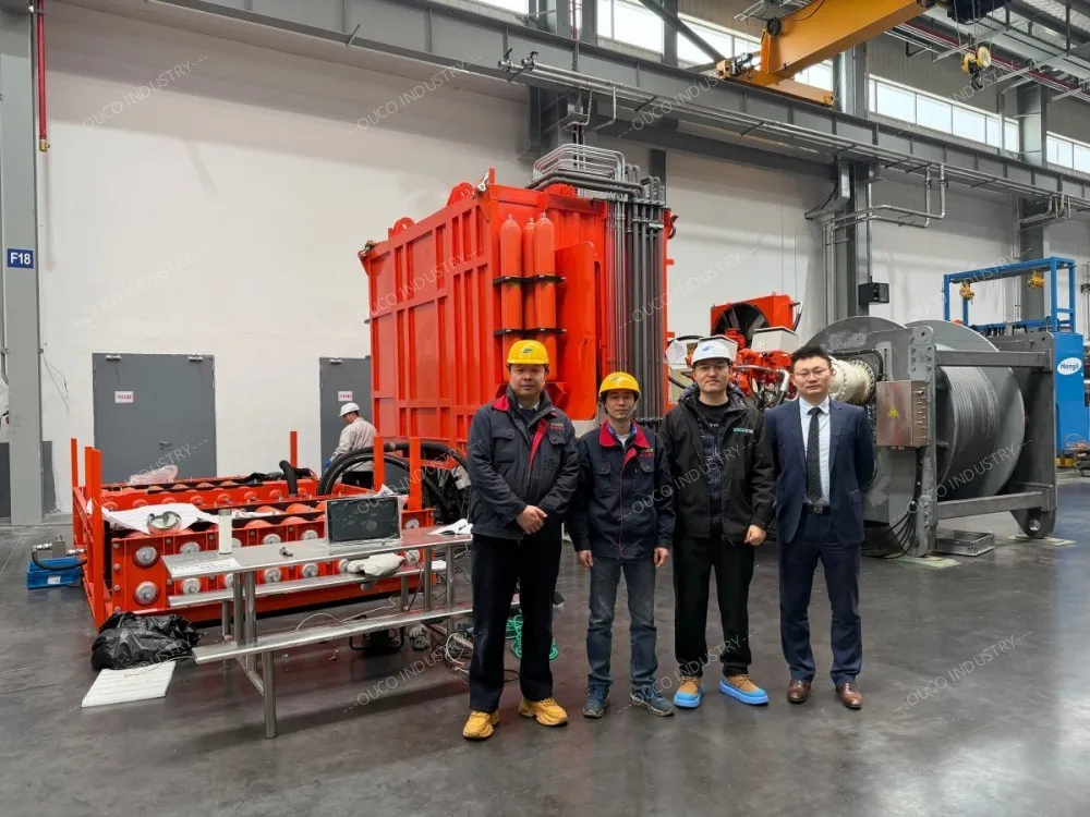 OUCO Team Take a Group Photo in the AHC Winch Workshop