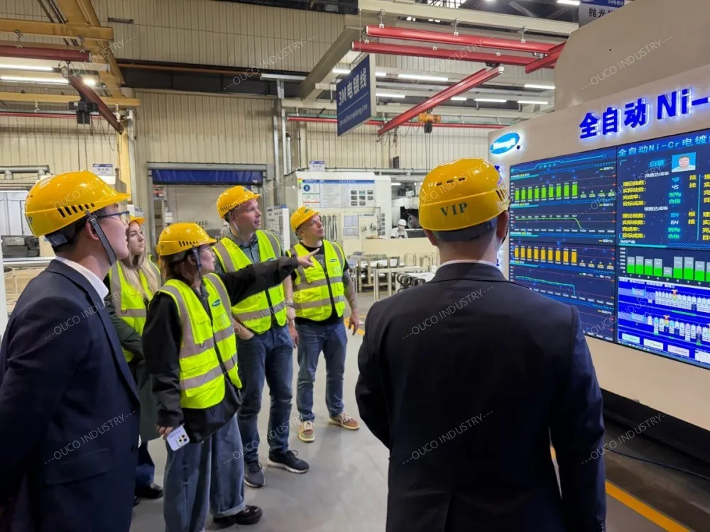 observing a digital production display board in the factory