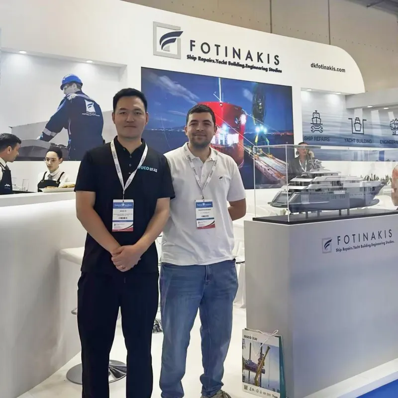 OUCO team visiting DK FOTINAKIS LTD booth