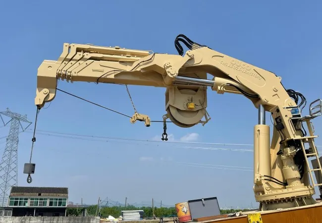 1.5t12m offshore folding boom crane fully extended during outdoor testing