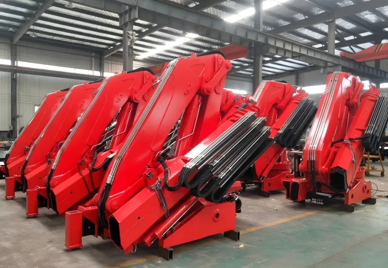 OUCO In-stock foldable cranes neatly lined up in the warehouse for quick delivery